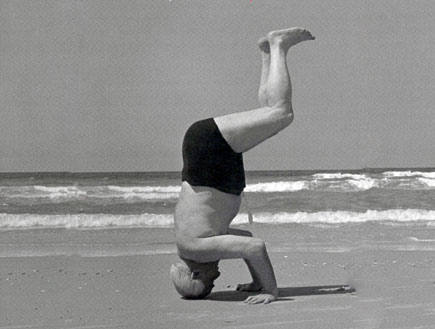 David Ben Gurion standing on his head at the beach